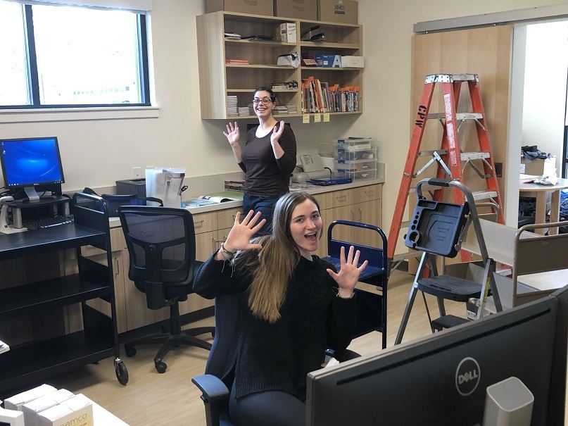 Staff giving Jazz Hands