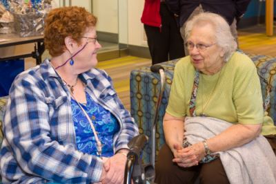Two Elderly Women Talking
