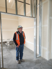 Public Works Director Mark Crowell in future office area of Drake Learning Center